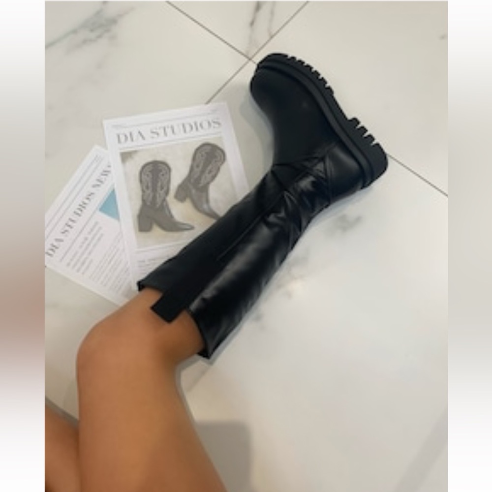 Chunky black knee high boots